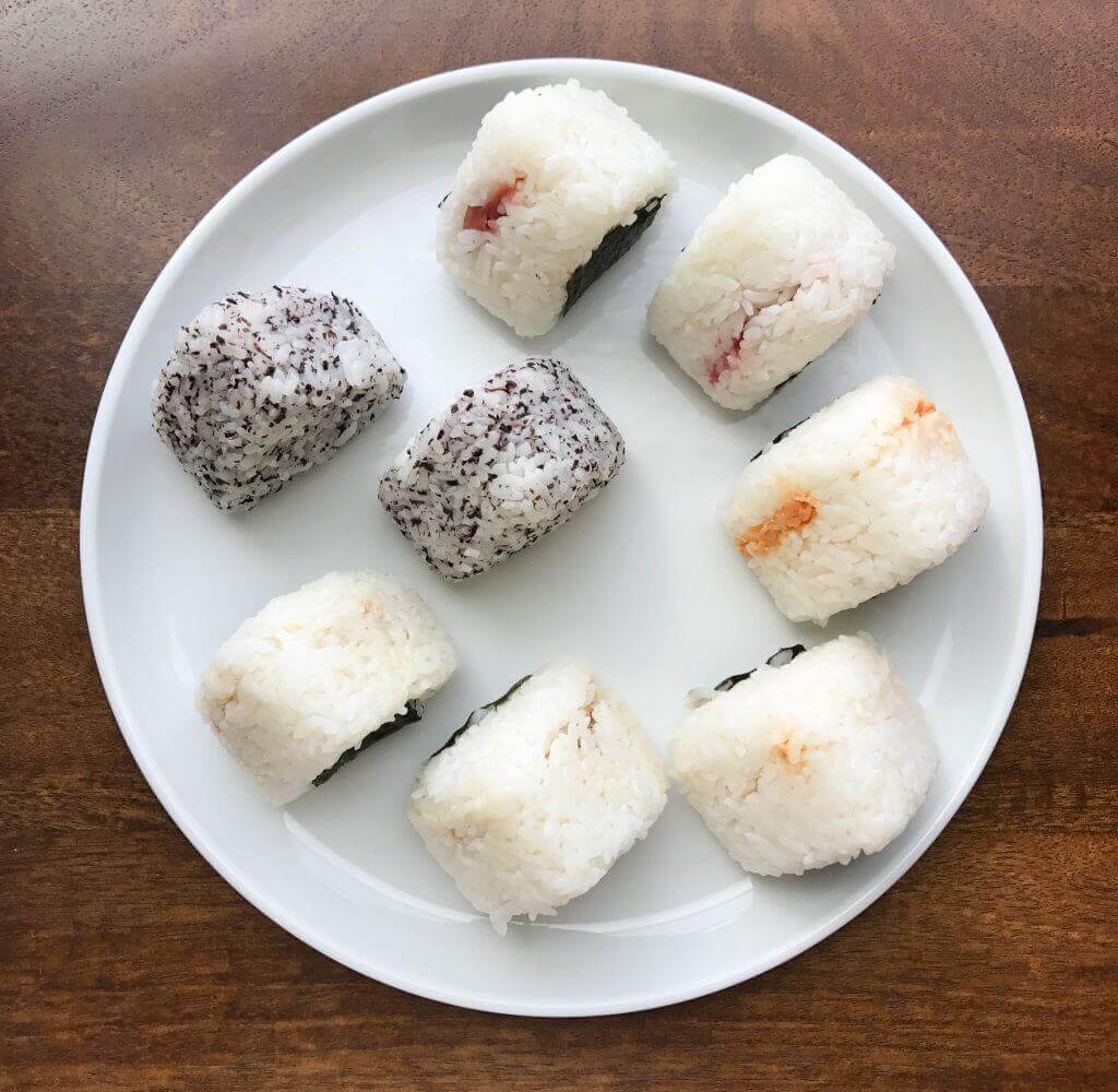 Omusubi (Japanese rice balls) with tuna, salted salmon, and umeboshi