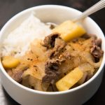 Nikujaga Japanese Meat & Potato Stew with rice closeup