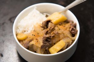 Nikujaga Japanese Meat & Potato Stew with rice closeup