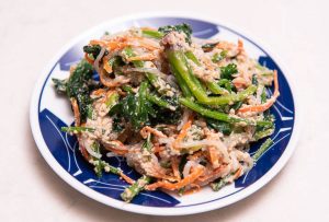 Japanese tofu recipe Carrot, Spinach, and Shirataki noodles (Shiraae) closeup