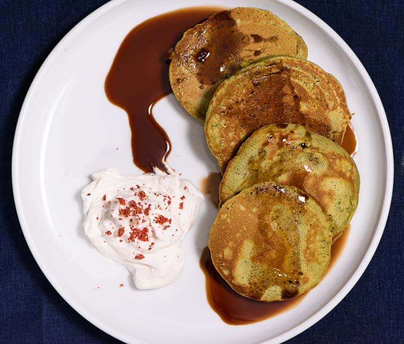 matcha pancakes with kuromitsu and vanilla bean cream overhead