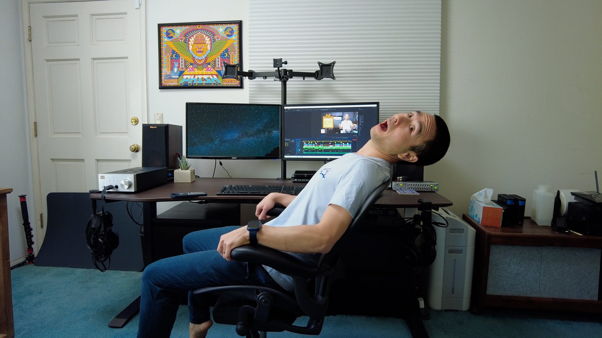 Pat Tokuyama sitting in his herman miller chair