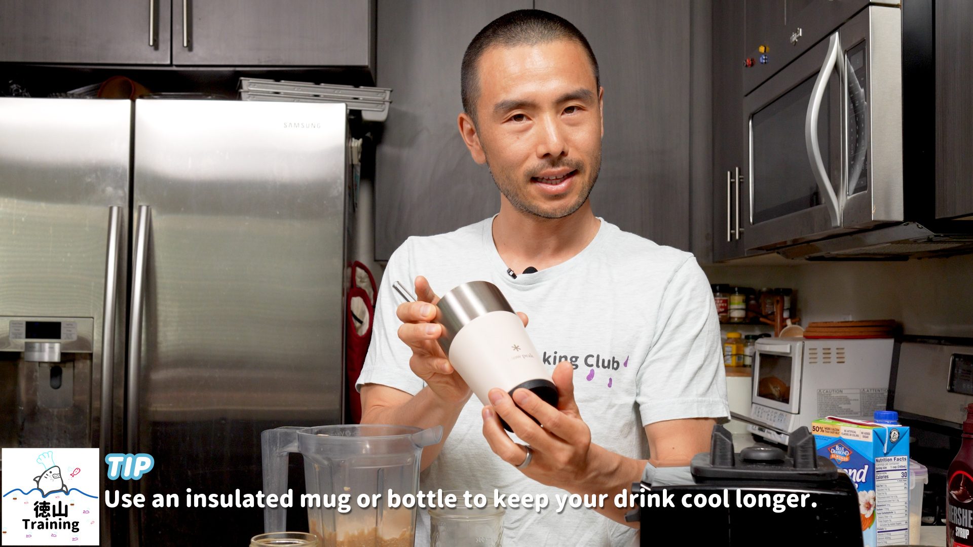 Pat Tokuyama showing Snow Peak stainless insulated mug to be used in ice-blended mocha