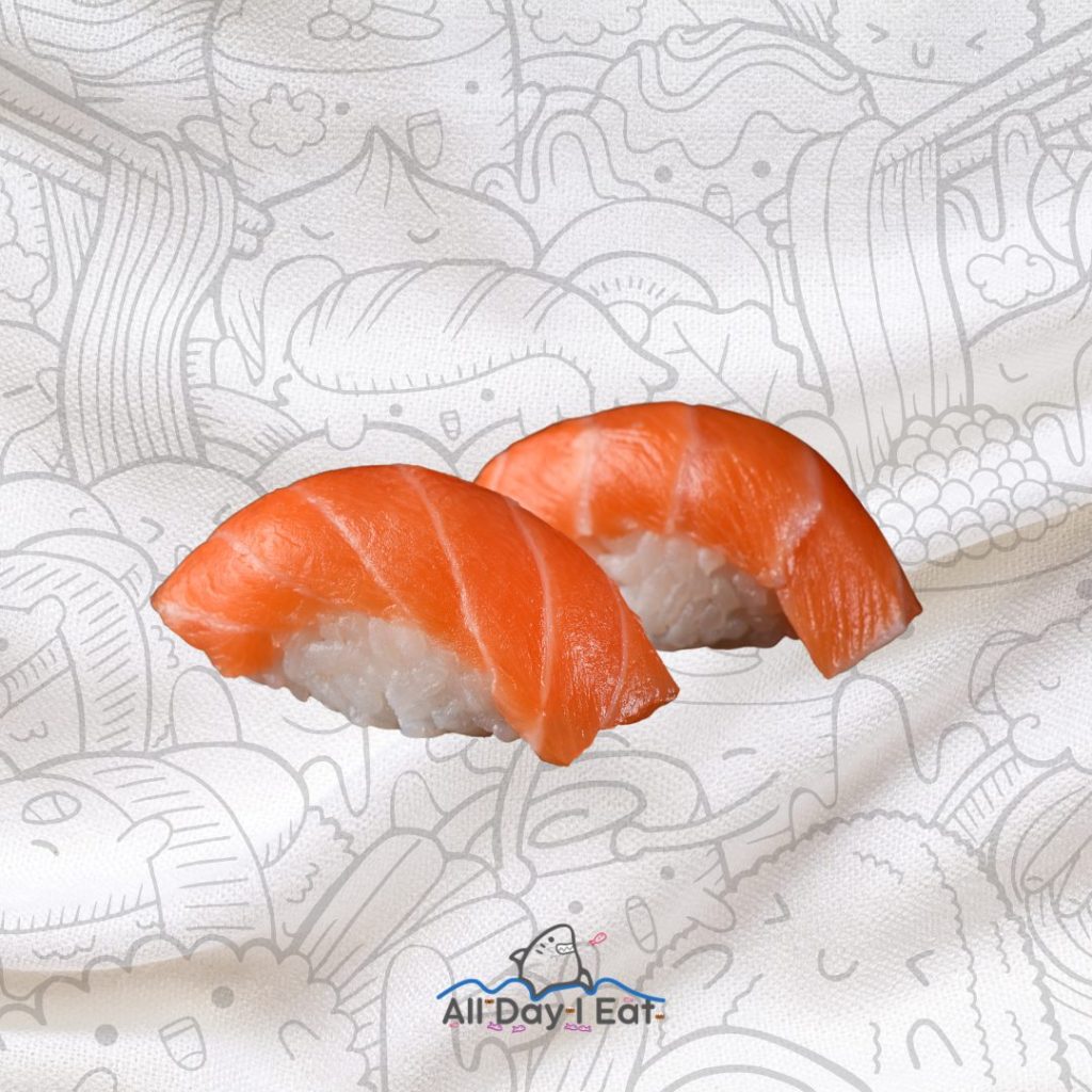 Two pieces of nigiri sushi on a white background.