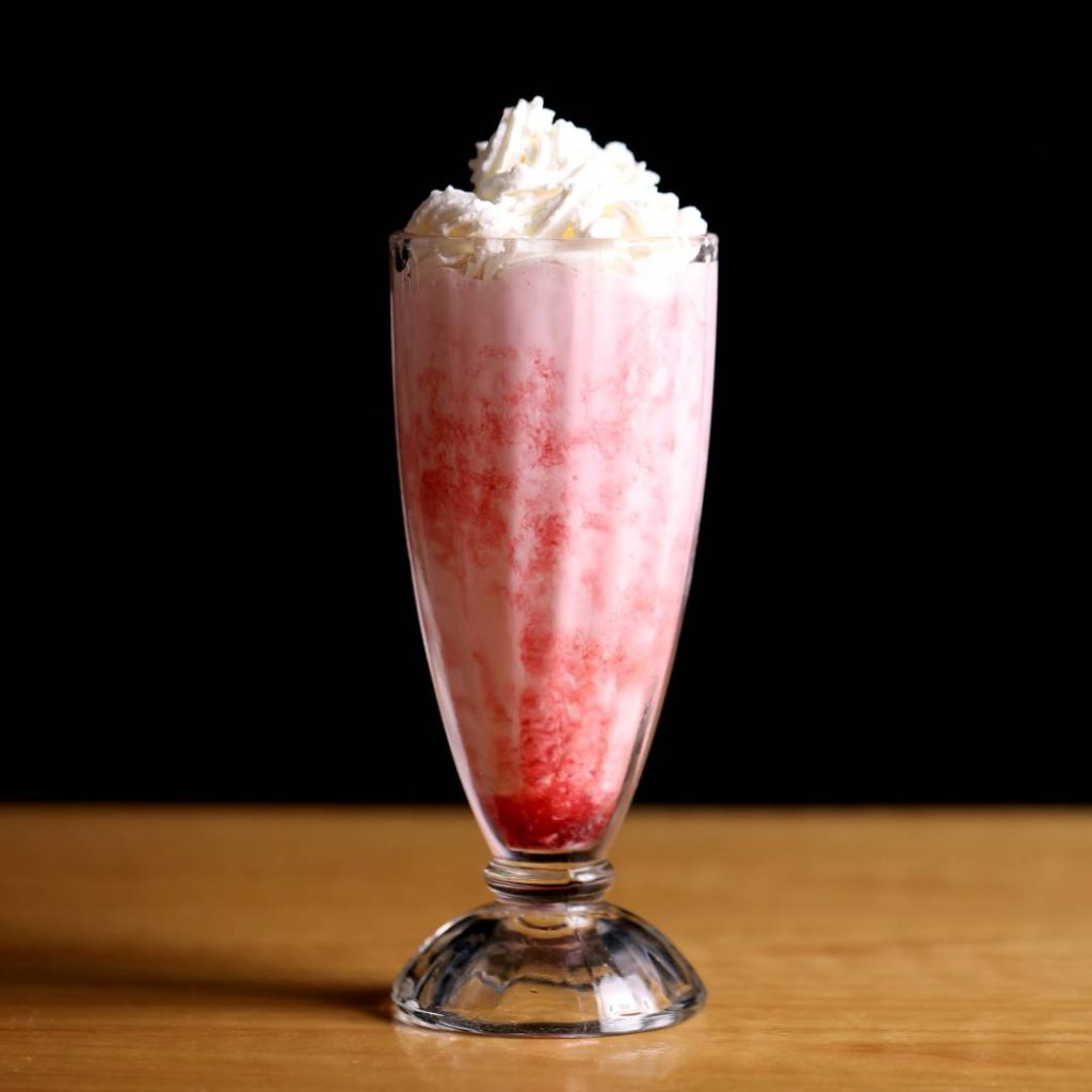 strawberry slushie with whipped cream