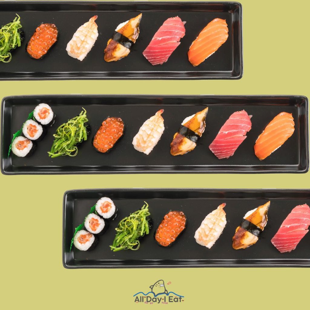 Four black trays of sushi, a delicious Japanese cuisine that was invented centuries ago. When was sushi invented?