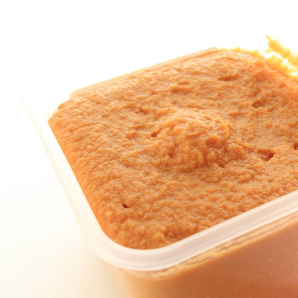 yellow miso paste in a container