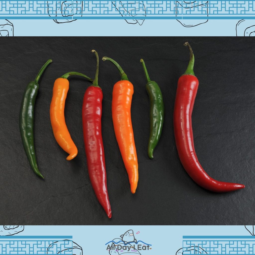 Chile peppers on a blue background.