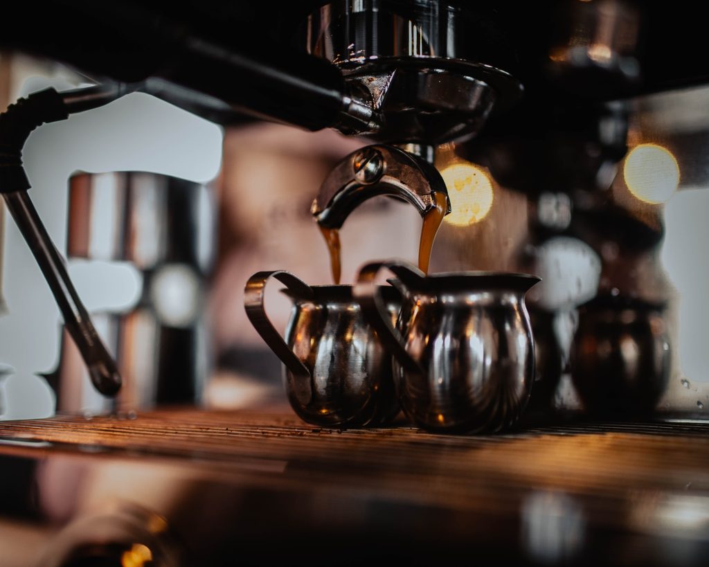 A coffee machine in Hokkaido is pouring coffee into cups