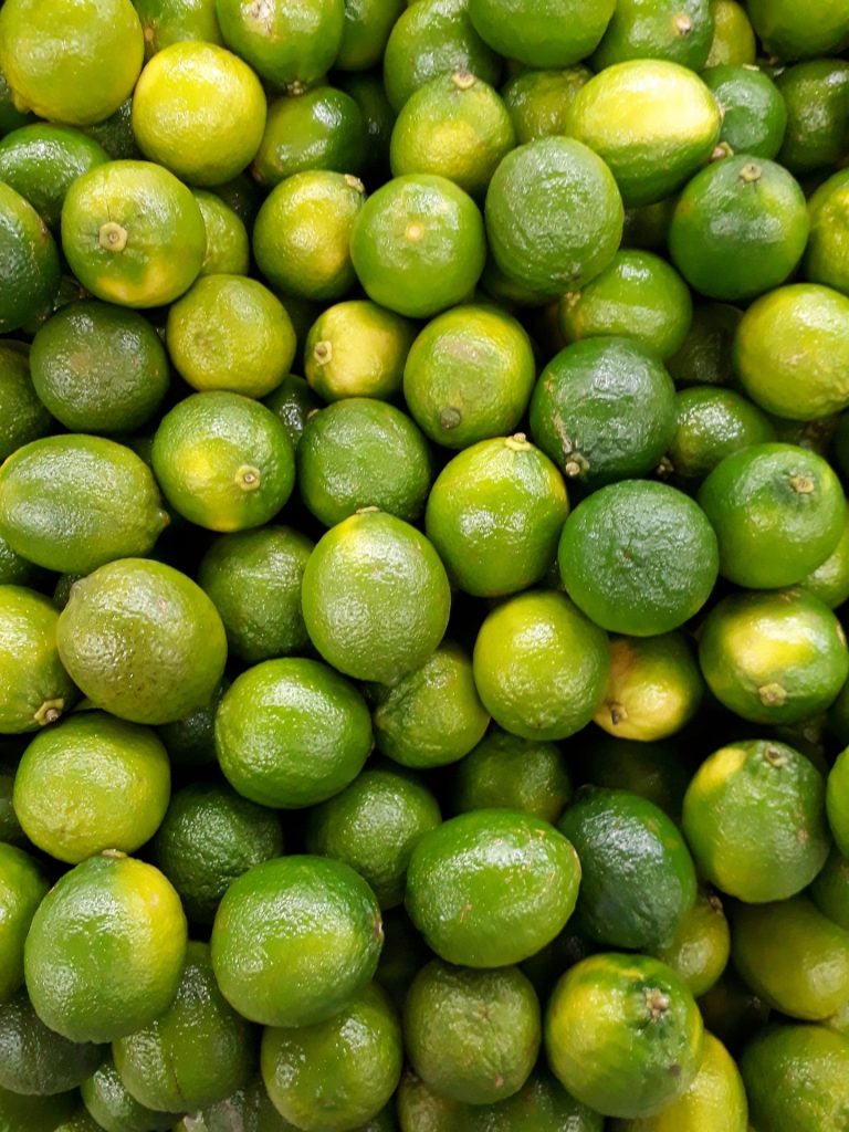 A close up of a bunch of Okinawa limes.