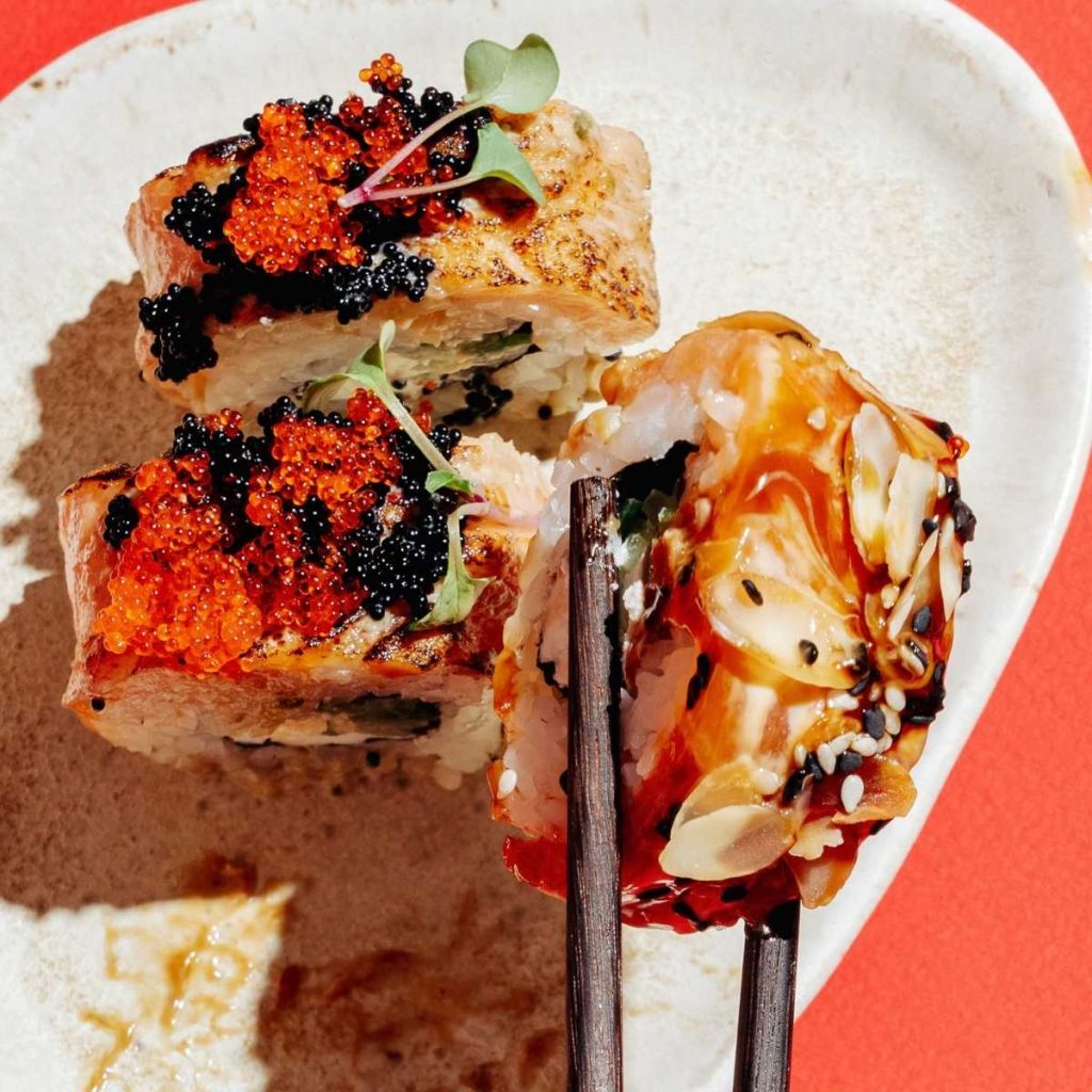 A plated Japanese food on a vibrant color backdrop