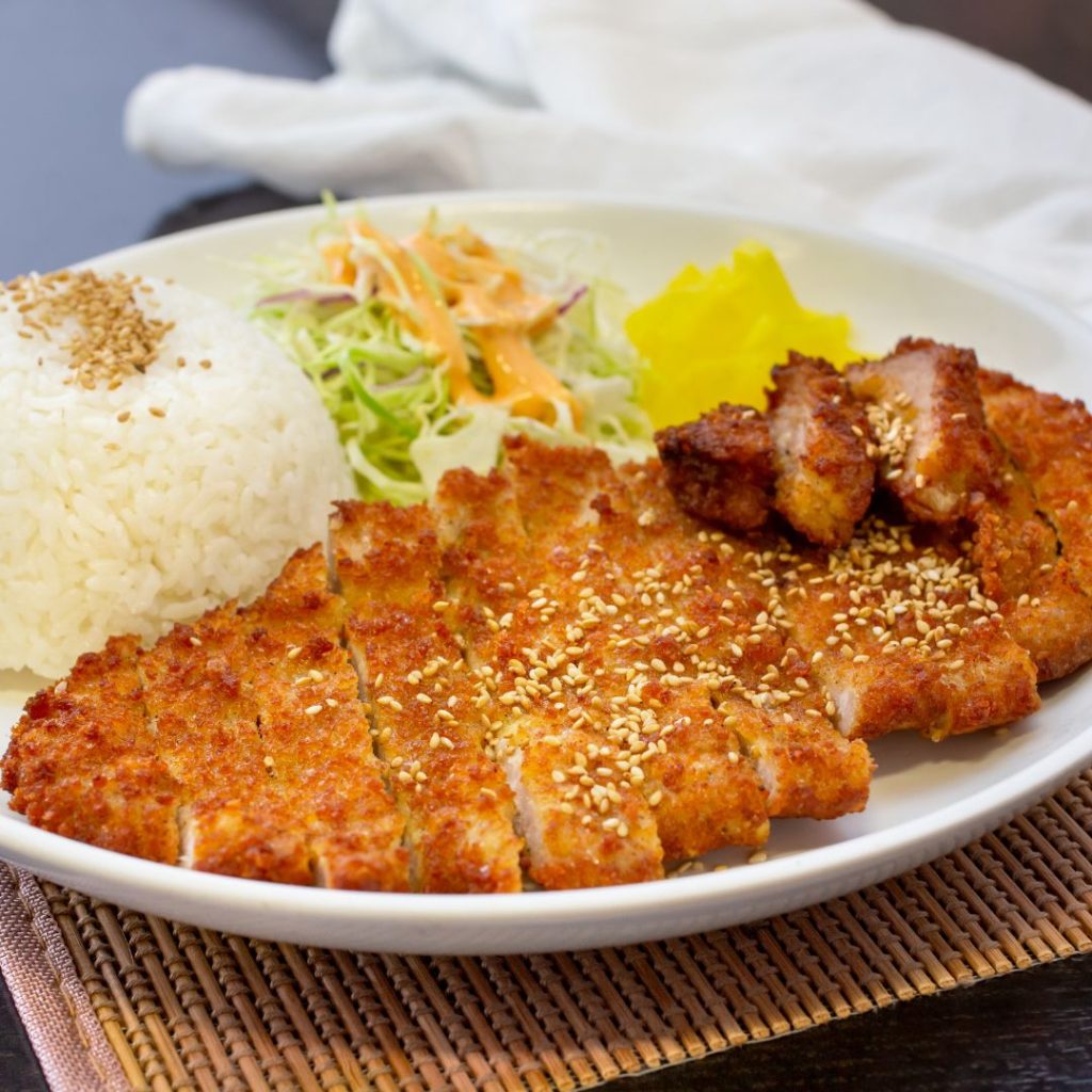 Chicken katsu with bamboo mat underneath