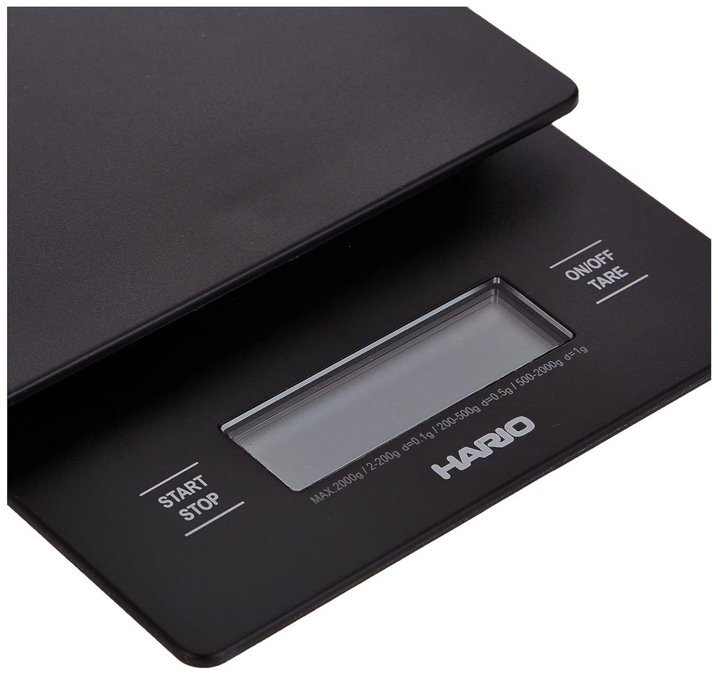 A Hario V60 Drip Scale Review featuring a kitchen scale with an electronic display.