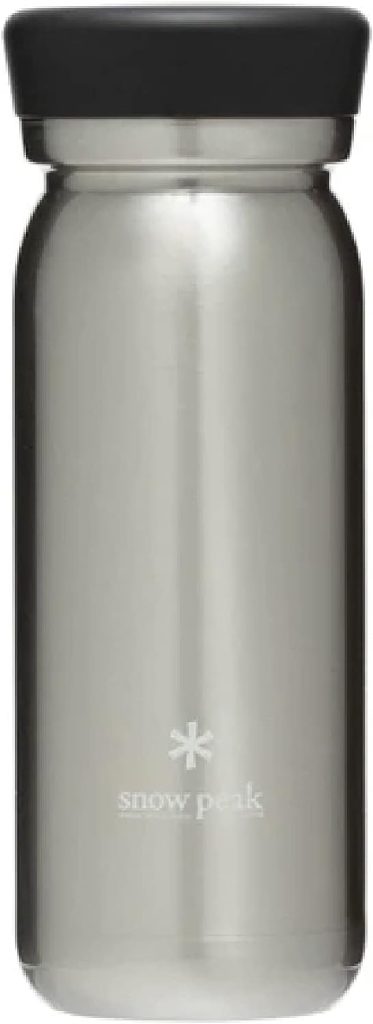 A stainless steel jar with a black lid - Snow Peak Milk Bottle Review.