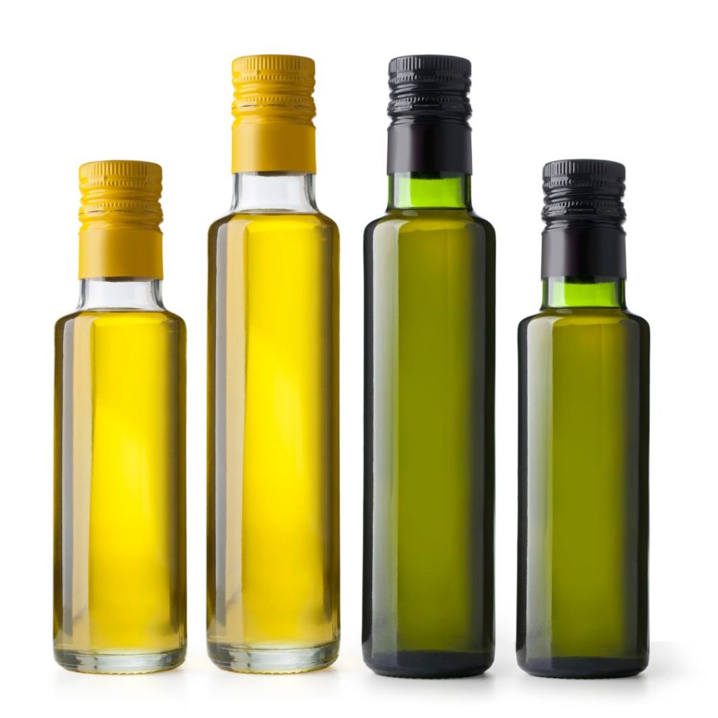 Four bottles of olive oil.