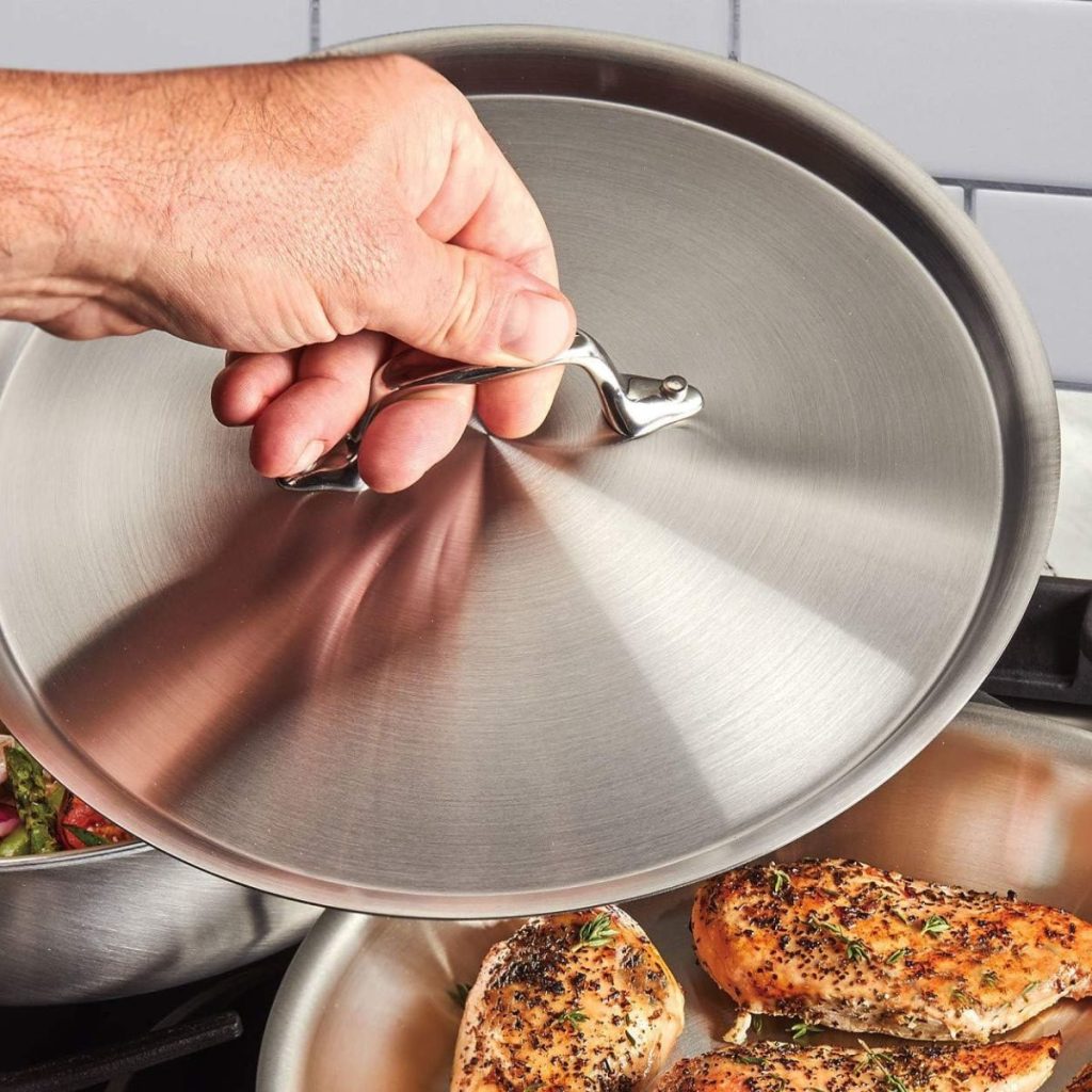 An All-Clad Weeknight Pan is used to cook chicken breasts. (Photo Courtesy of Amazon/All-Clad Weeknight Pan Review)