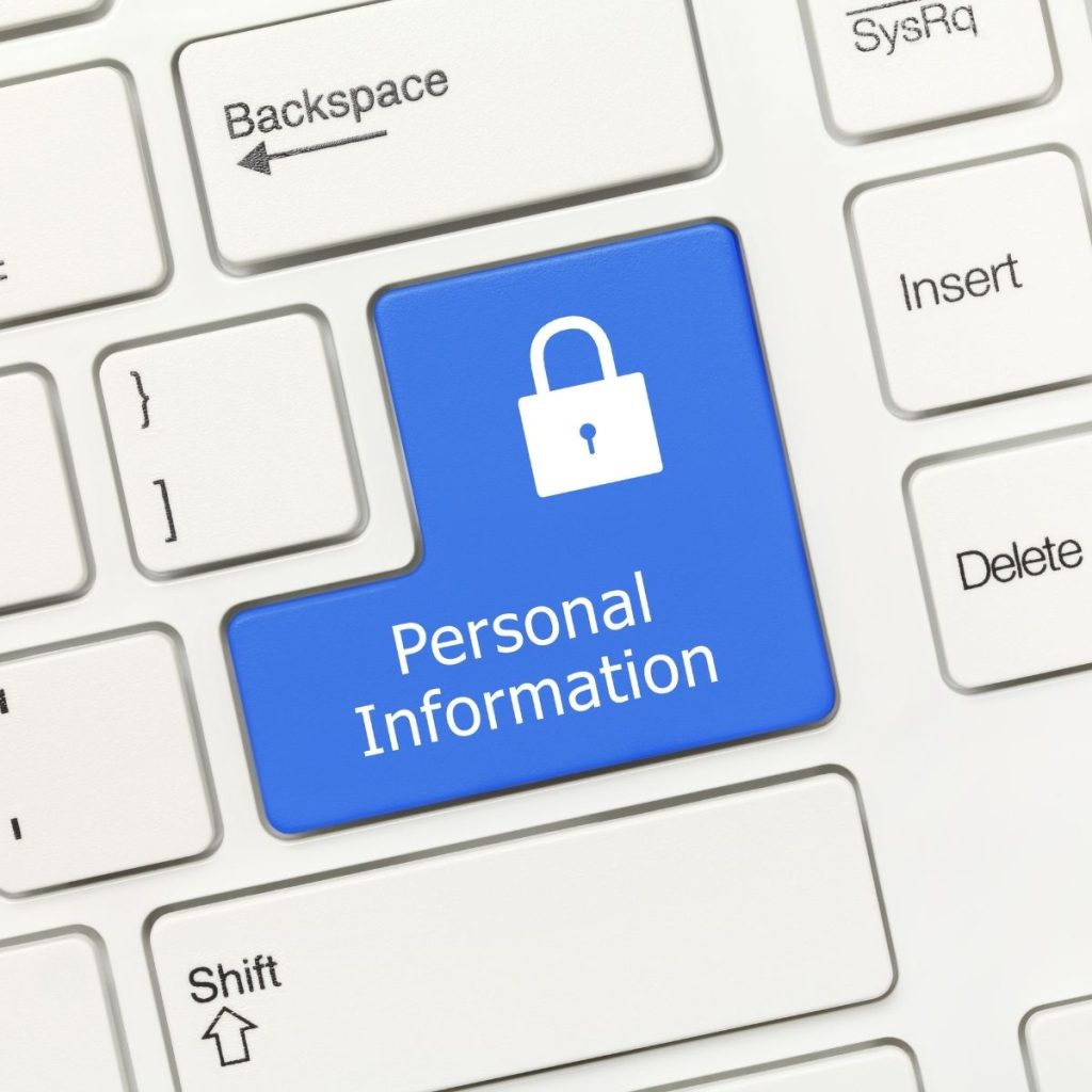 The text "personal information" is displayed on a keyboard.