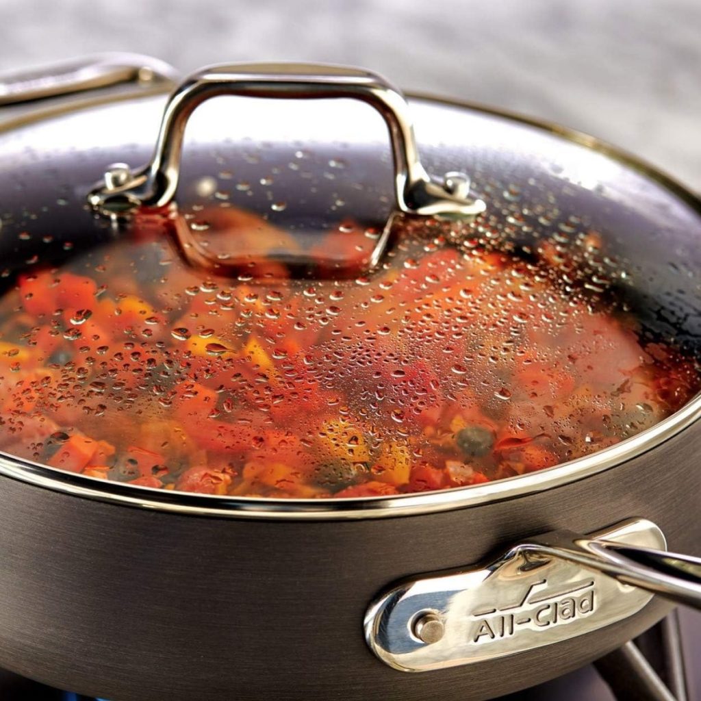 An All-Clad Hard Anodized pan is used to cook some vegetables. (Photo courtesy of Amazon)