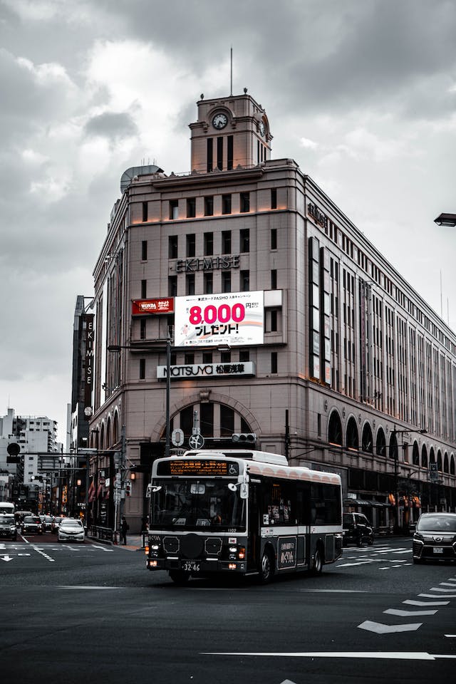 Best Transportation in Japan featuring a bus driving in front of Asakusa Station in Japan