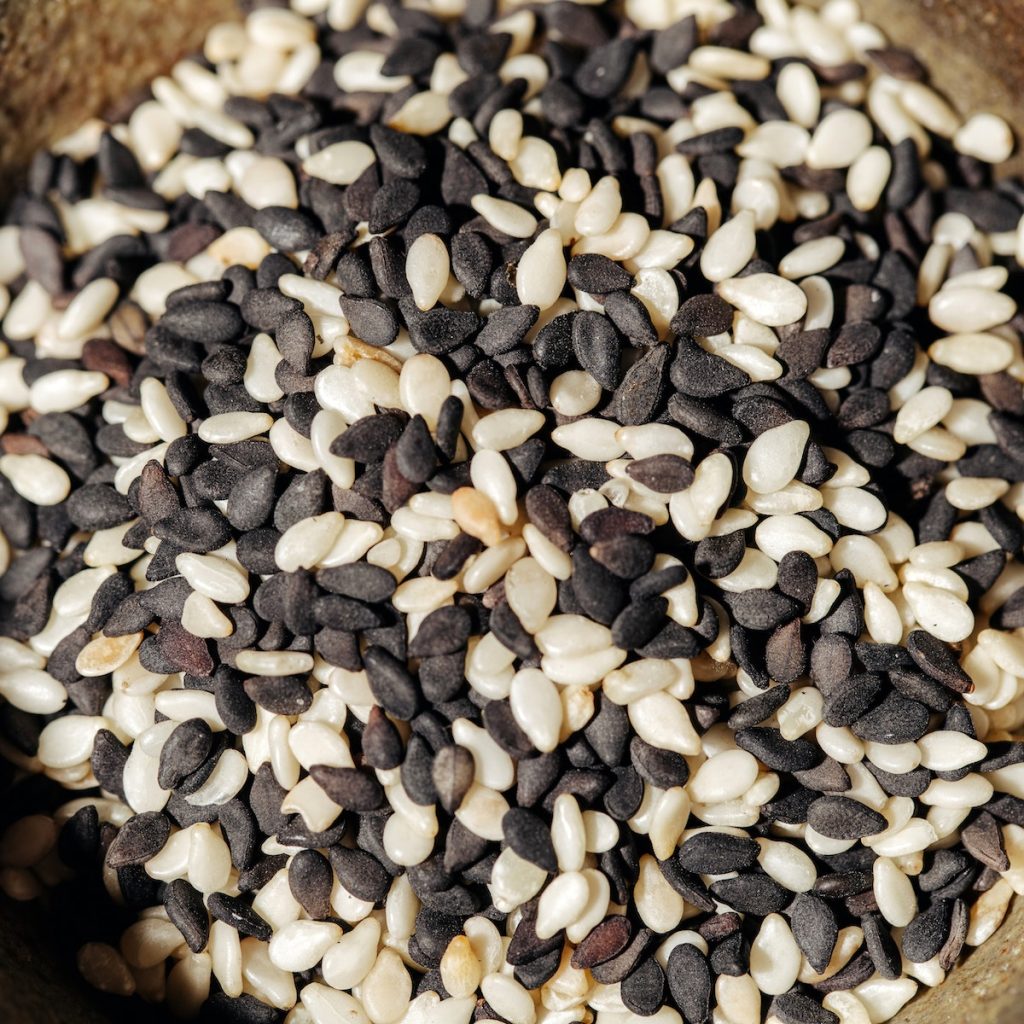 Close up photo of black and white sesame seeds