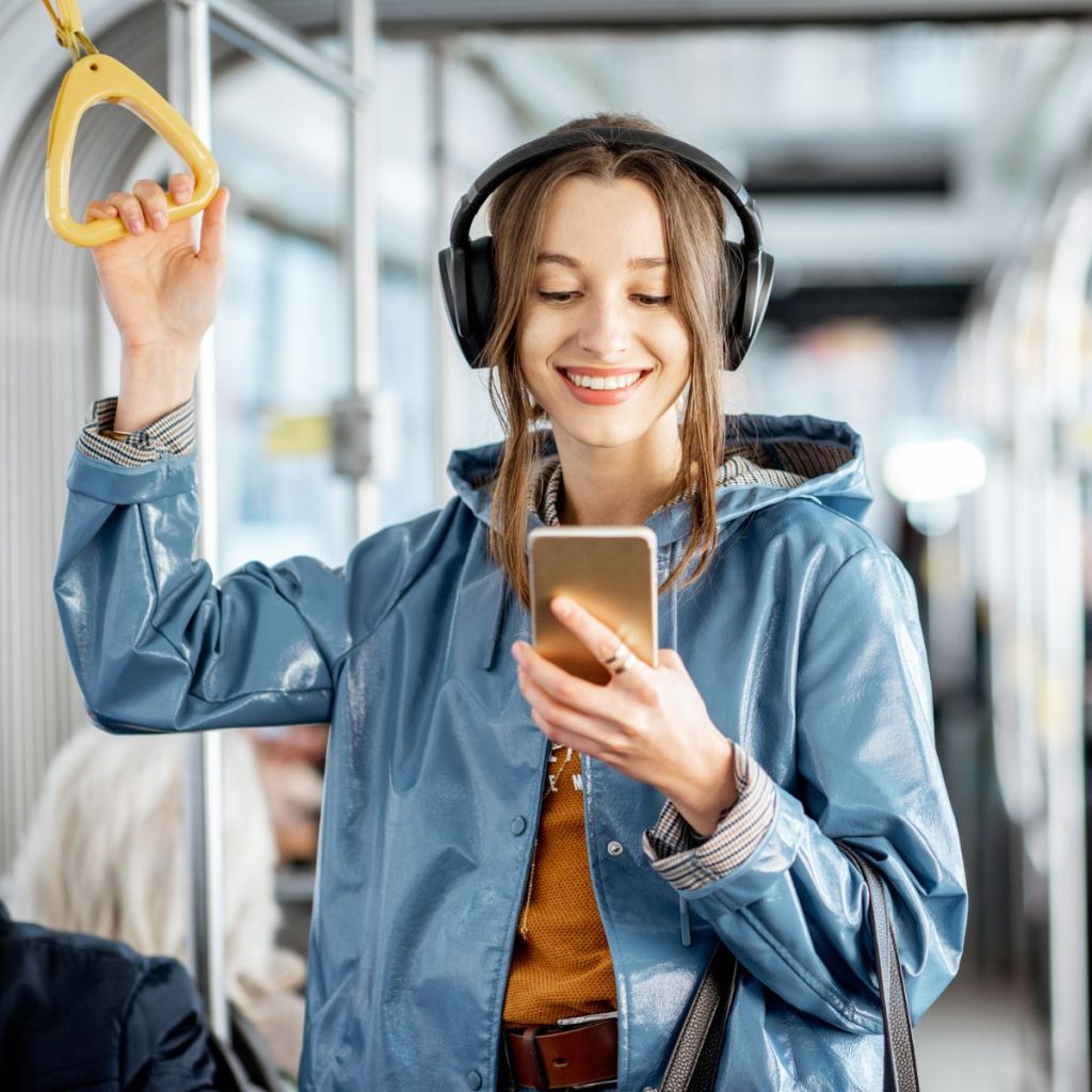 Female student using public transportation