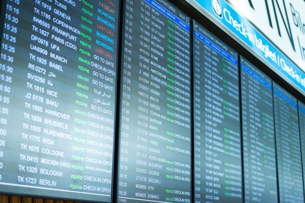 What Time of Year Is Cheapest to Fly to Japan featuring a flight departure board