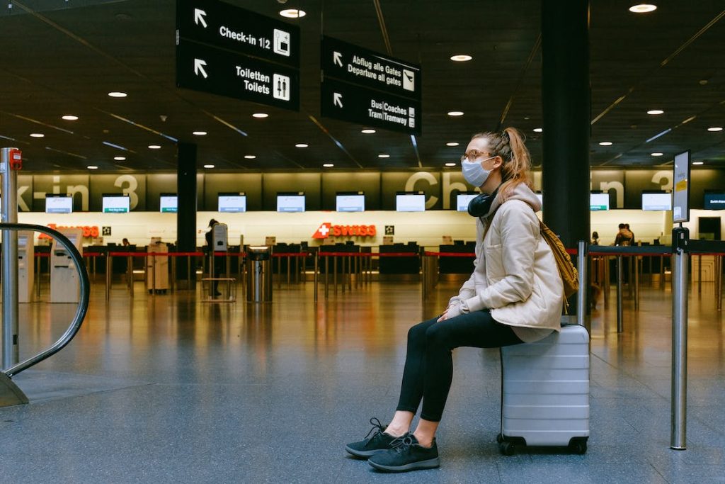 Girl taking a break inside an airport