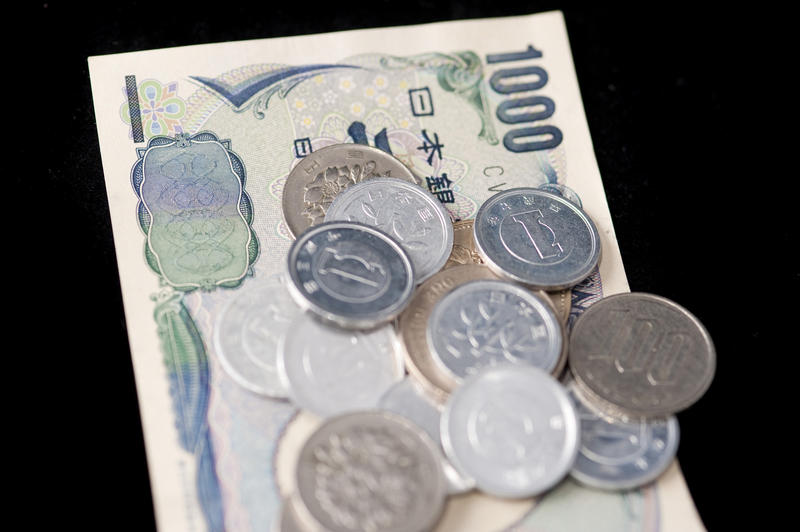 How Much Cash to Bring to Japan featuring Japanese Yen Coin and Paper Bills