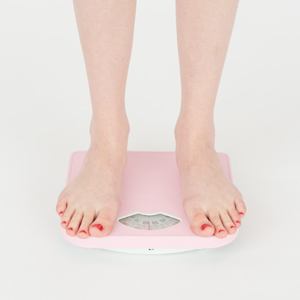 Person on a weighing scale