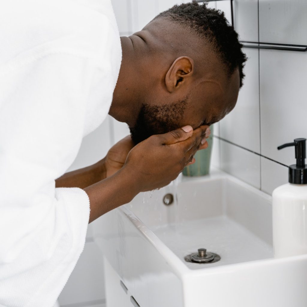 Person washing his face