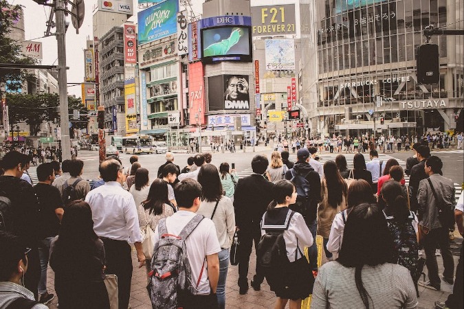 Best Place to Stay in Tokyo for Young Adults featuring crowded Shibuya Crossing