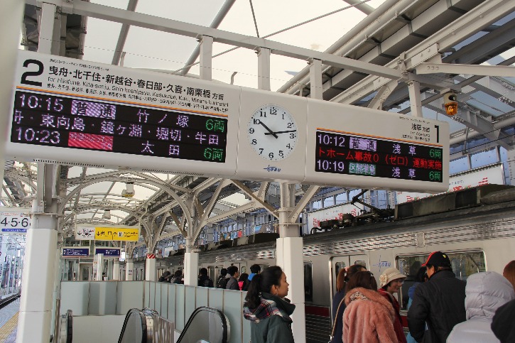 a busy train station in Japan