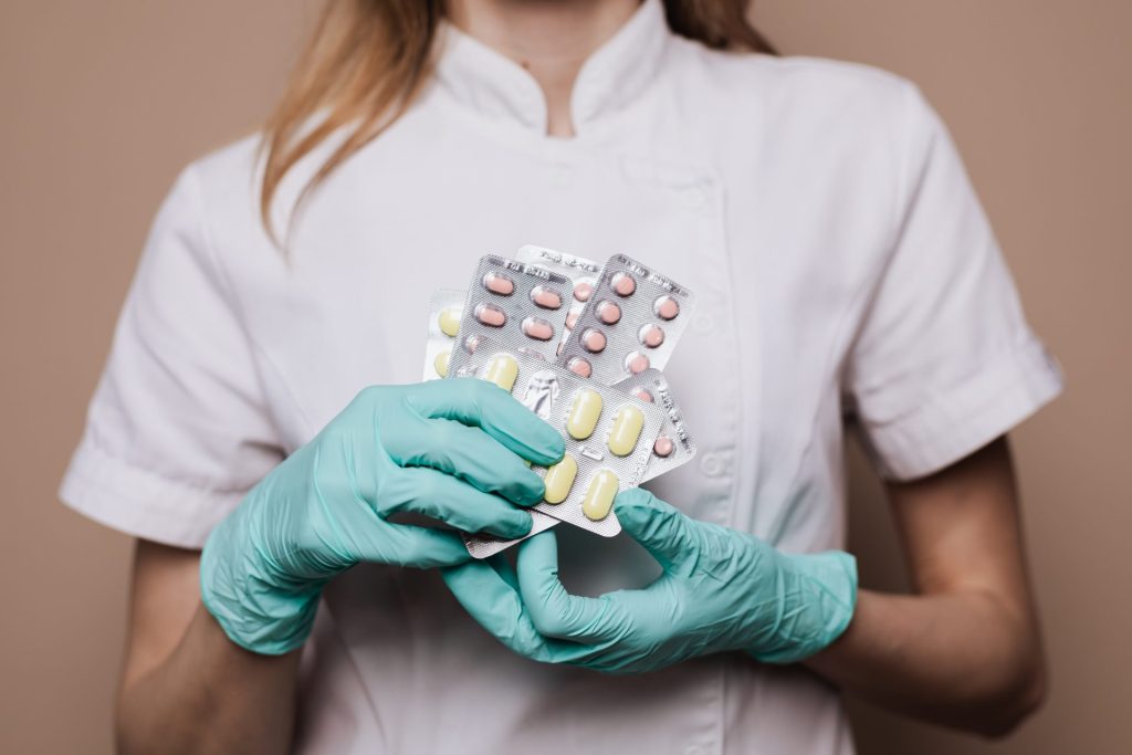 Are Antidepressants Illegal in Japan featuring a nurse holding some medicines