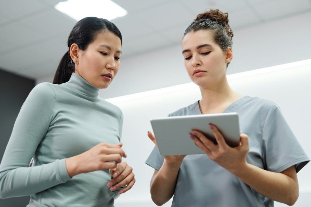 patient consulting a nurse