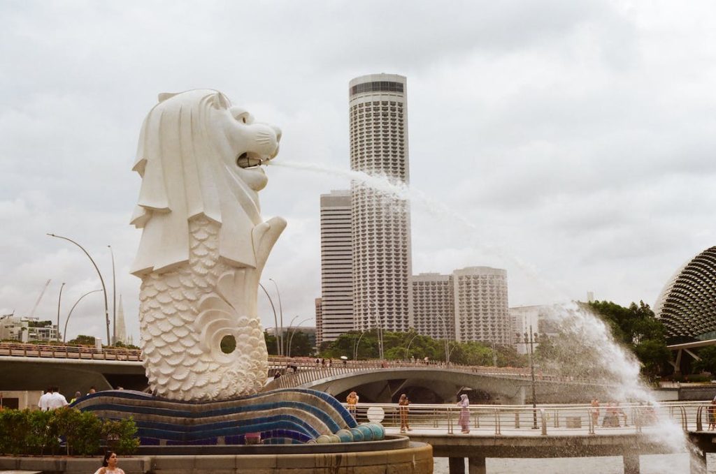 Singapore Vs Tokyo featuring the singapore merlion