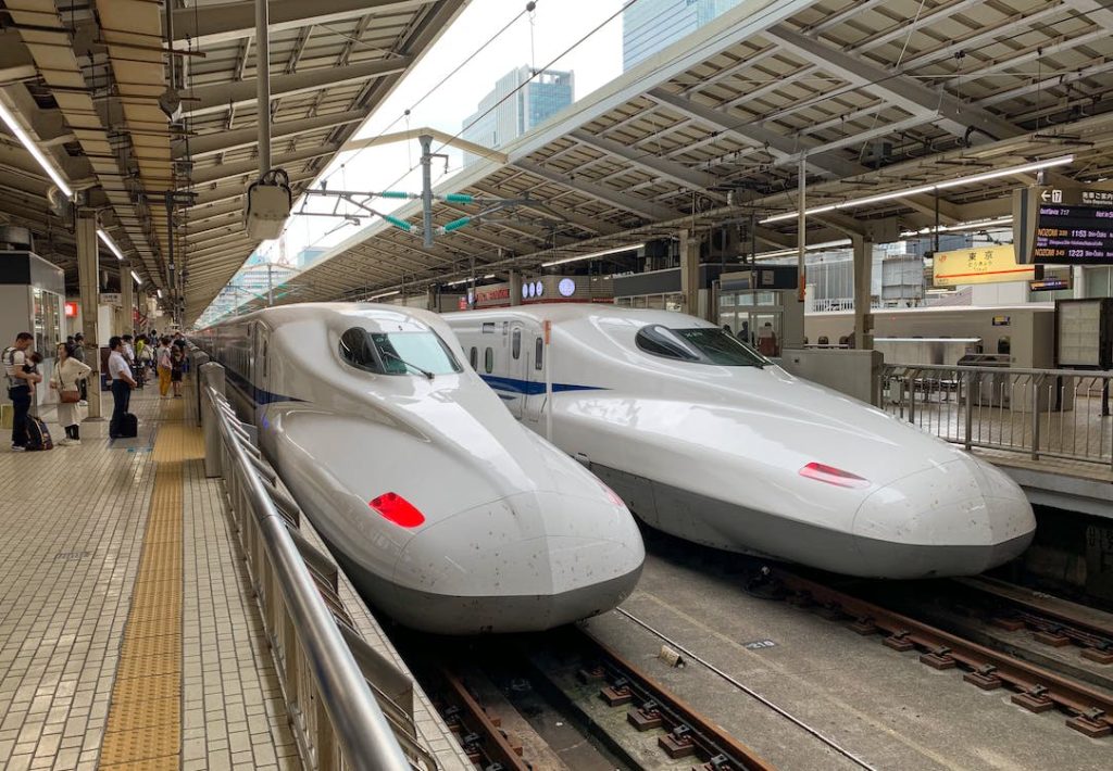 two shinkansen bullet trains