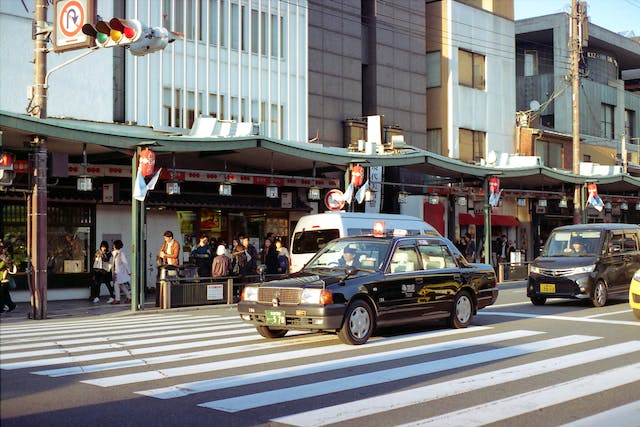 Best Transportation in Japan featuring vehicles stopped at an intersection