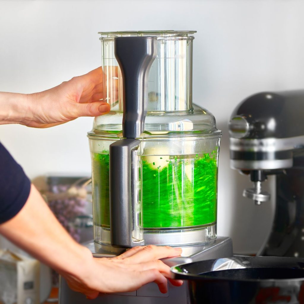 woman using food processor