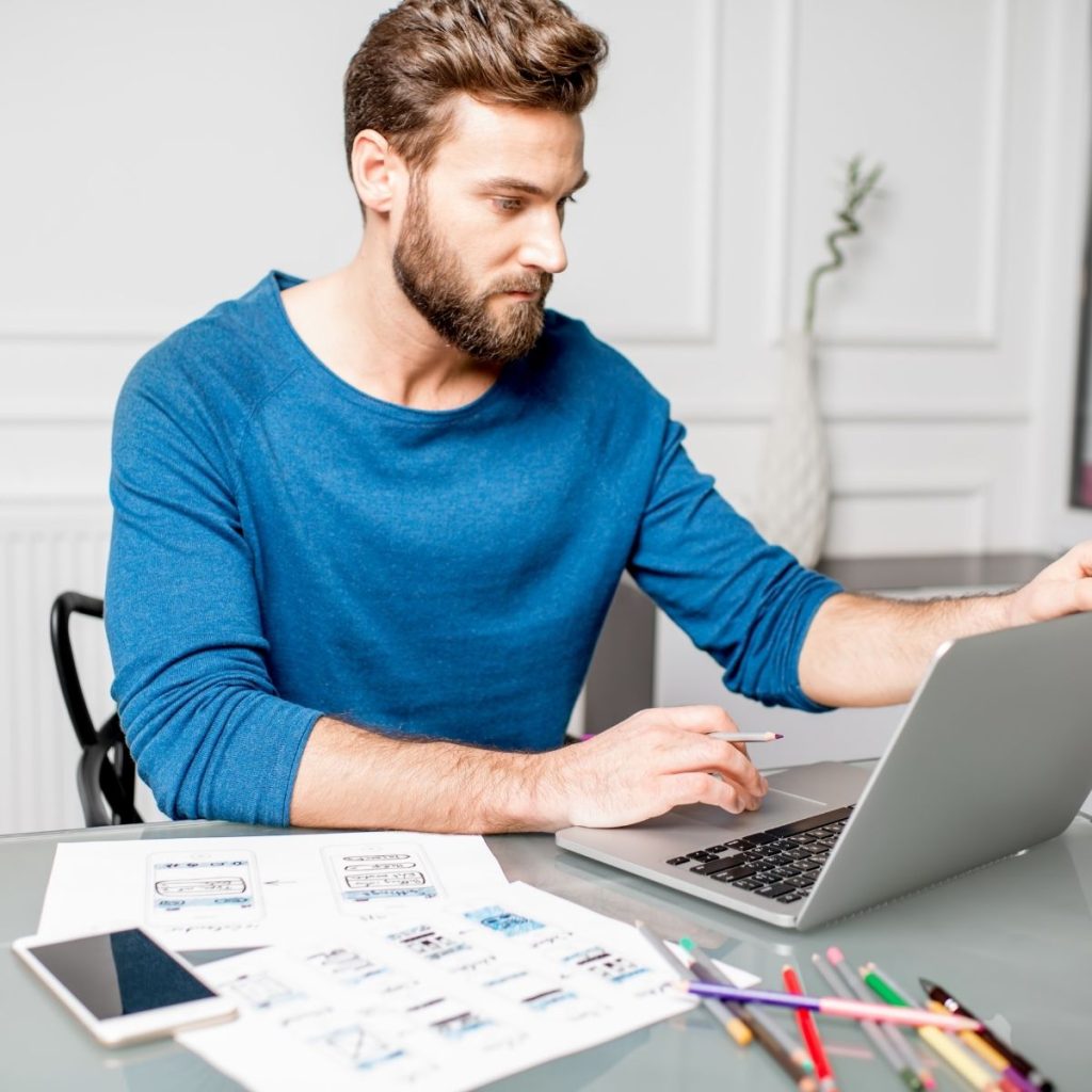 A man stares at his computer.