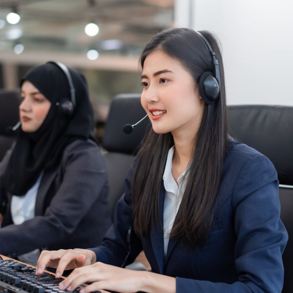 Customer Service Agent with Headsets Working in a Call Center