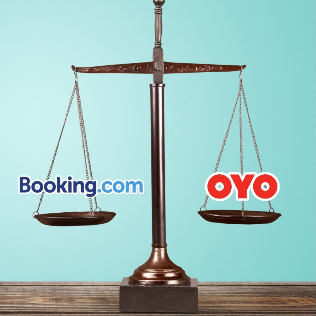 The Booking.com and Oyo logos are placed on a balanced weighing scale. (ADIE Article: Booking.com vs. Oyo