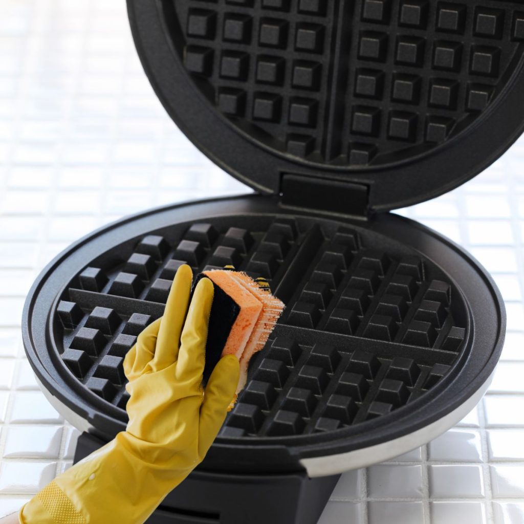 https://alldayieat.com/wp-content/uploads/2023/11/cleaning-cooking-plate-of-waffle-maker-1-1024x1024.jpg