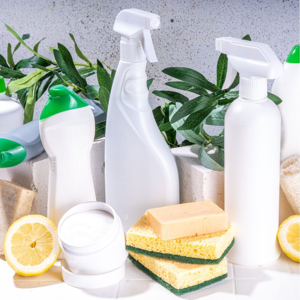 Different cleaning supplies like soap and sponge