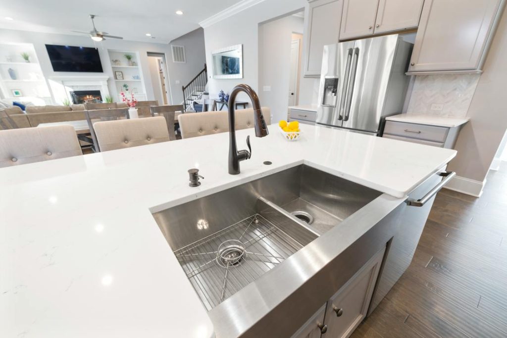 a dual sink on a white countertop