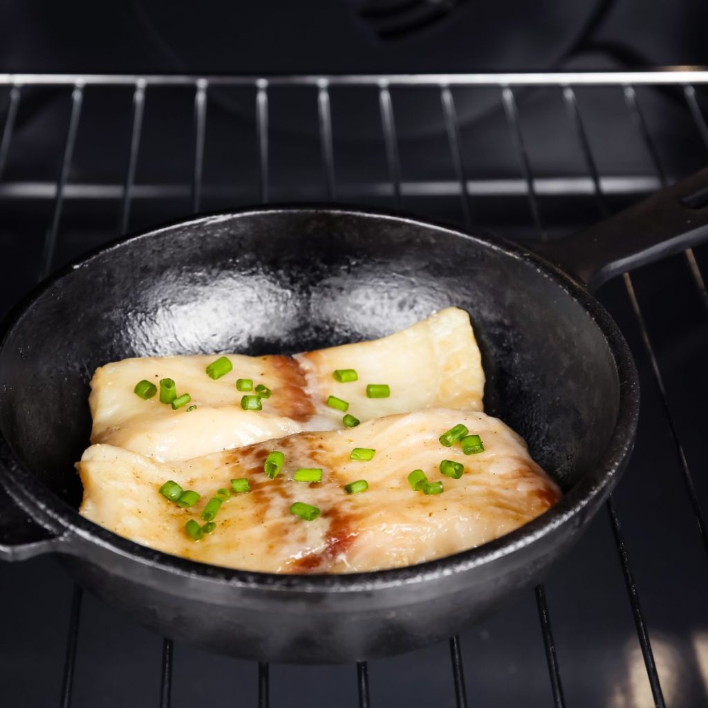 https://alldayieat.com/wp-content/uploads/2023/11/fry-pan-with-fish-inside-the-oven-1024x1024.jpg