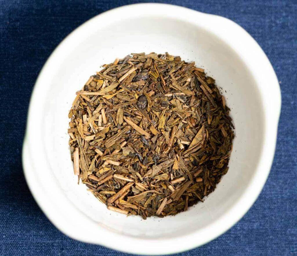 hojicha tea in white bowl