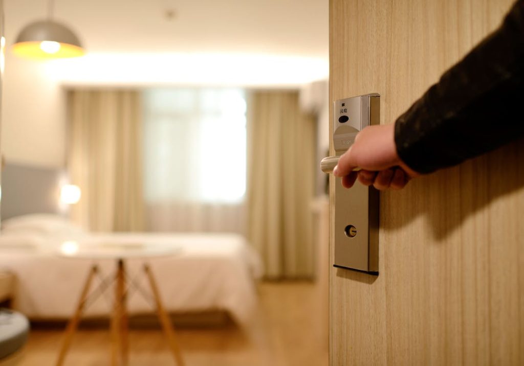 hotel room door being opened