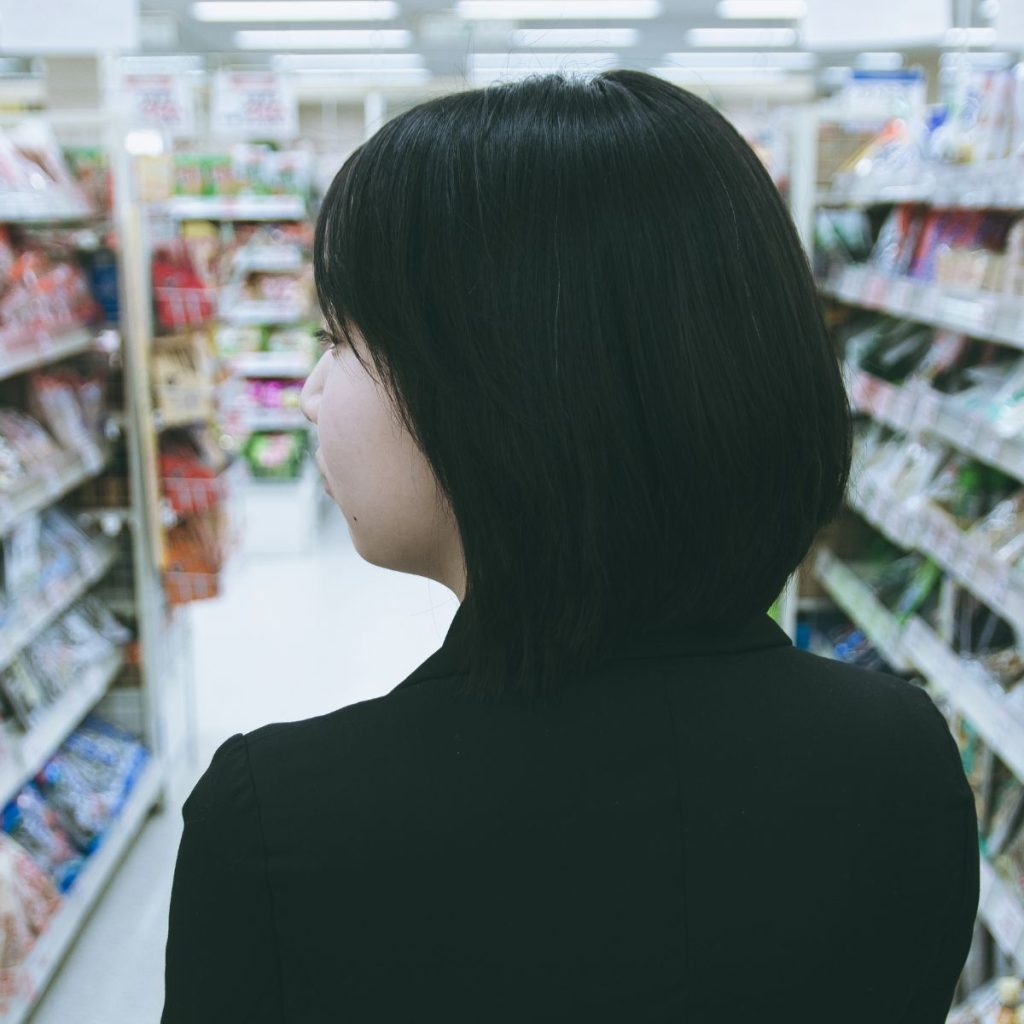 woman inside the Japanese grocery store