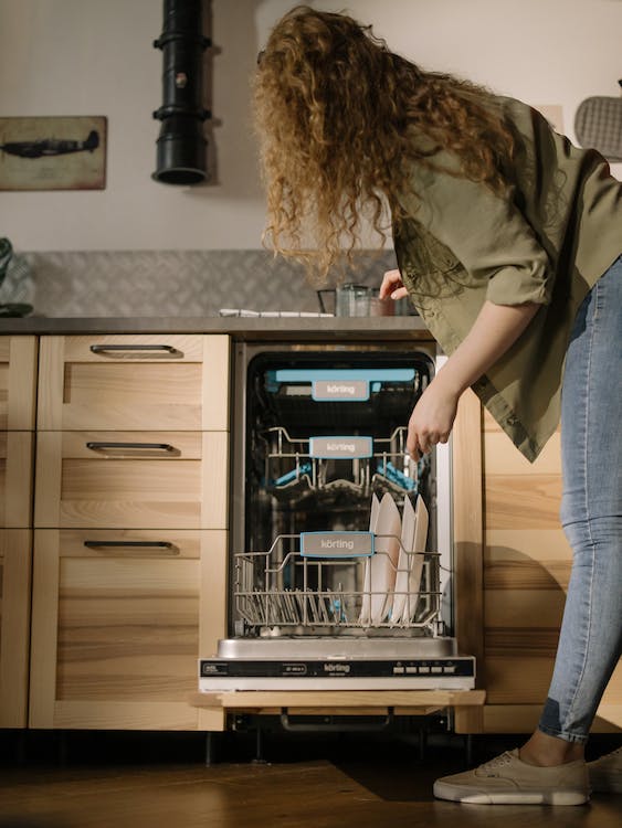 https://alldayieat.com/wp-content/uploads/2023/11/lady-using-a-dishwasher.jpg