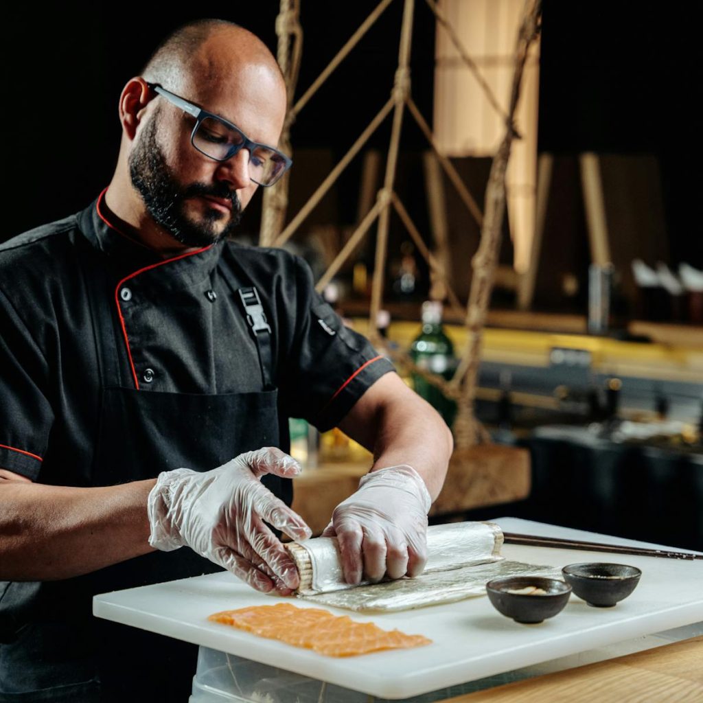 A man making a sushi 